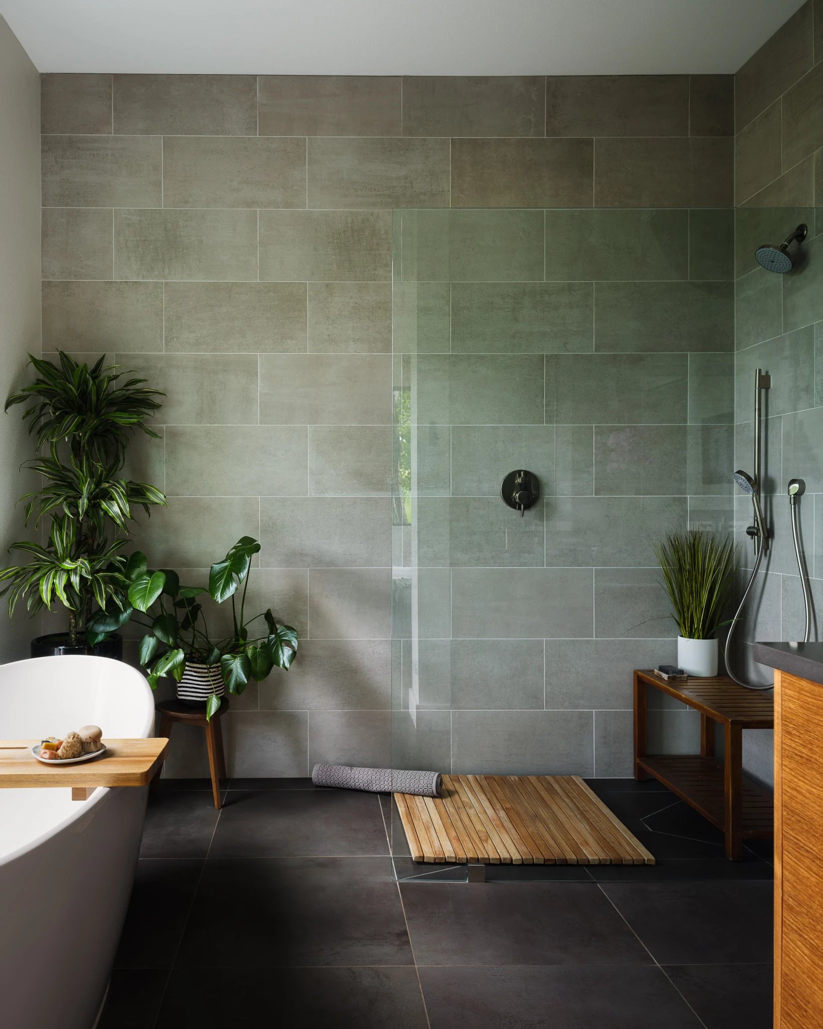 Spa bathroom with tiled walk-in shower and potted plants — interior design photography Bozeman Montana, Bozeman Overlook